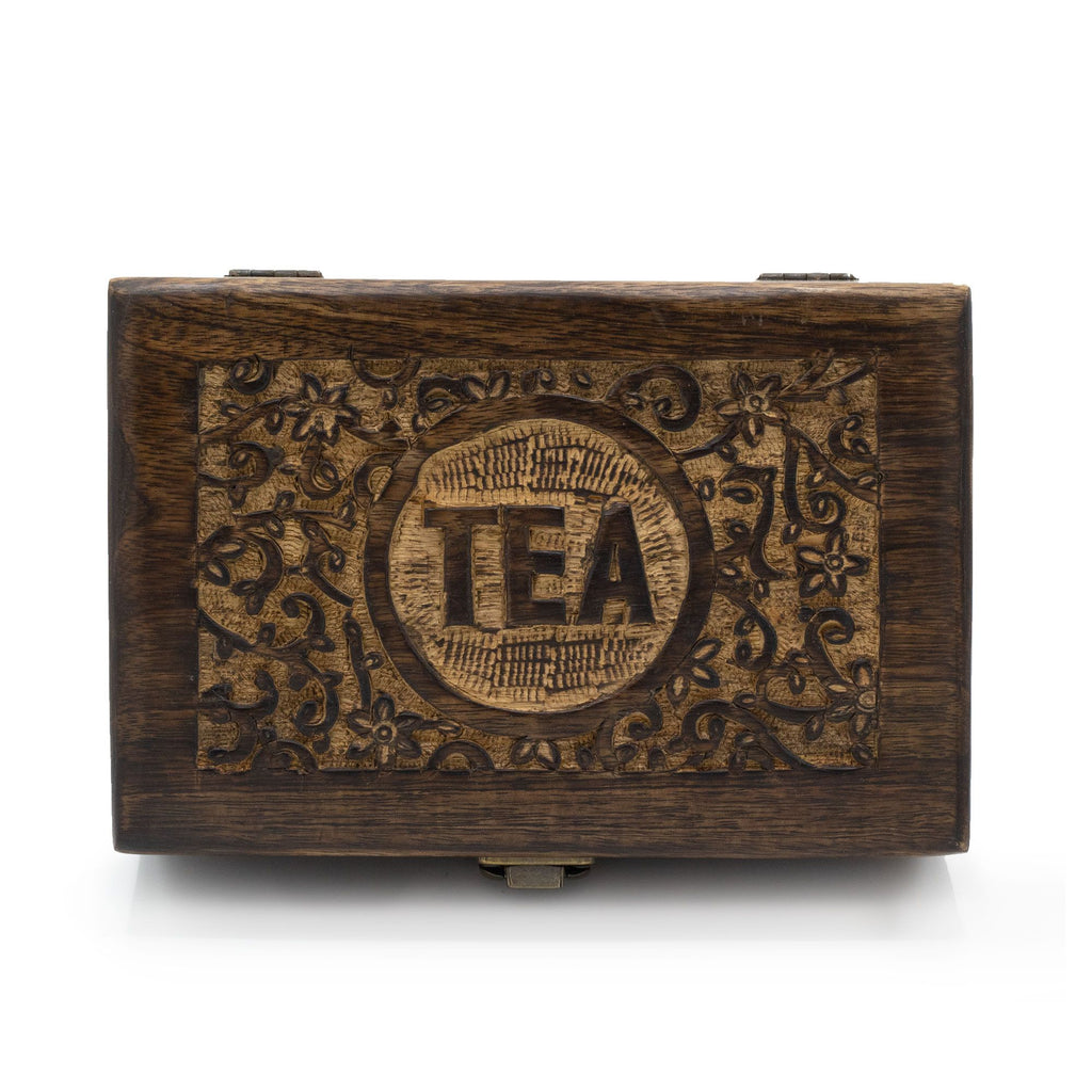 Carved wooden tea box with brass clasp